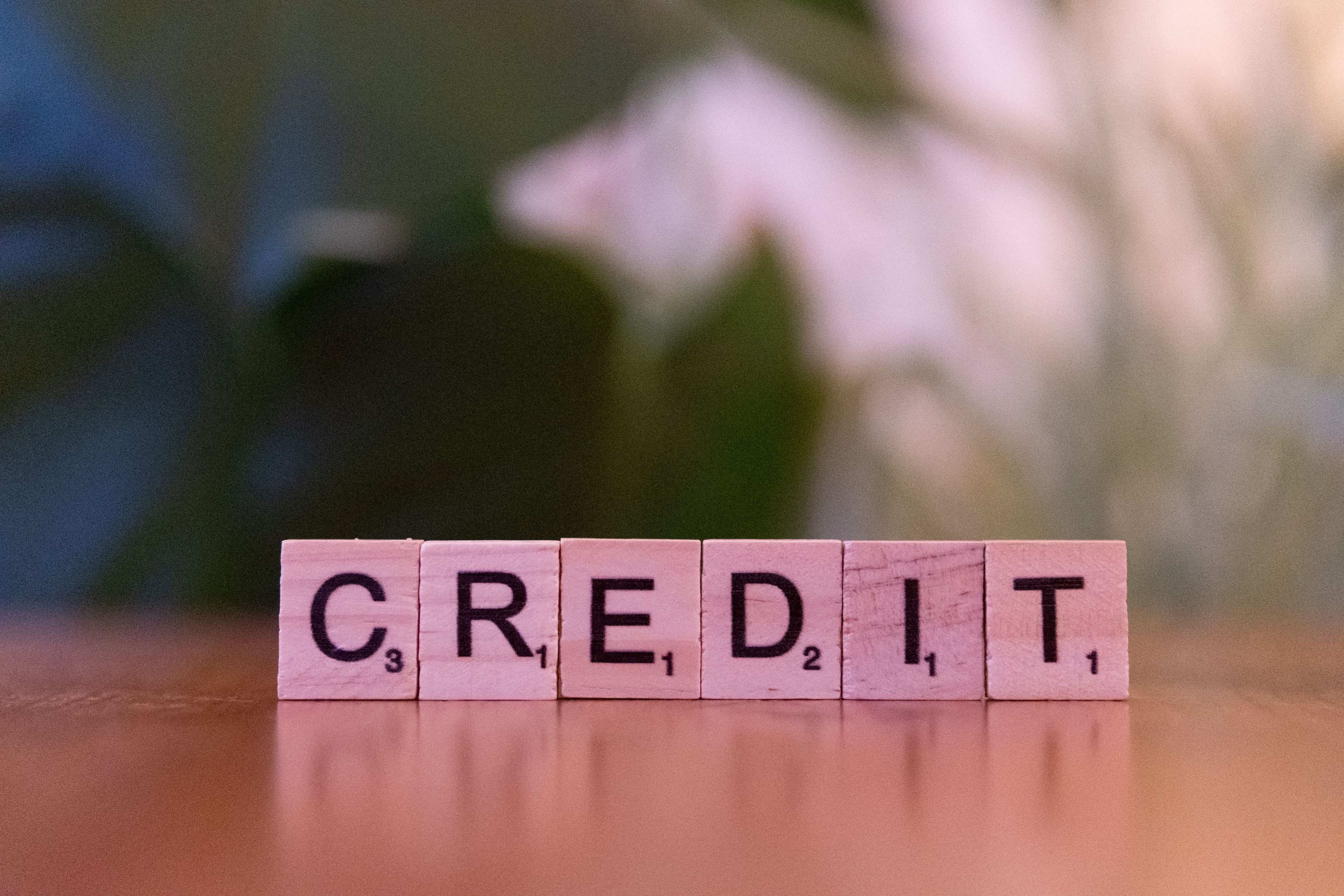 Letter tiles spelling out 'credit'