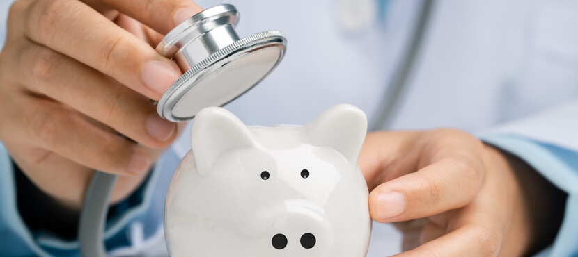 Image of a piggy back and a doctor signifying financial health.